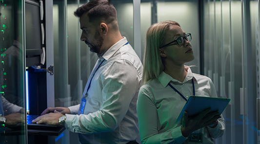IT pros in server room
