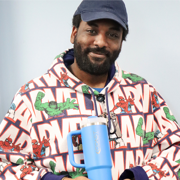 Happy man with Coast mug